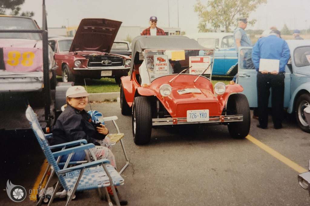 Family at a car show